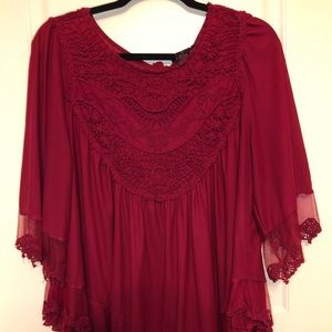 Red flowy top with lace trim